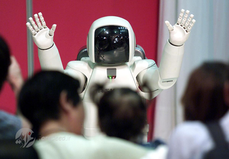 رونمایی از روبات "هوندا" در شرکت "کاواساکی" در توکیو. 9 سپتامبر 2001 